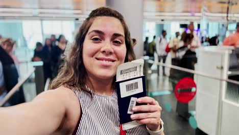 vlogger shares her travel documents in airport selfie video