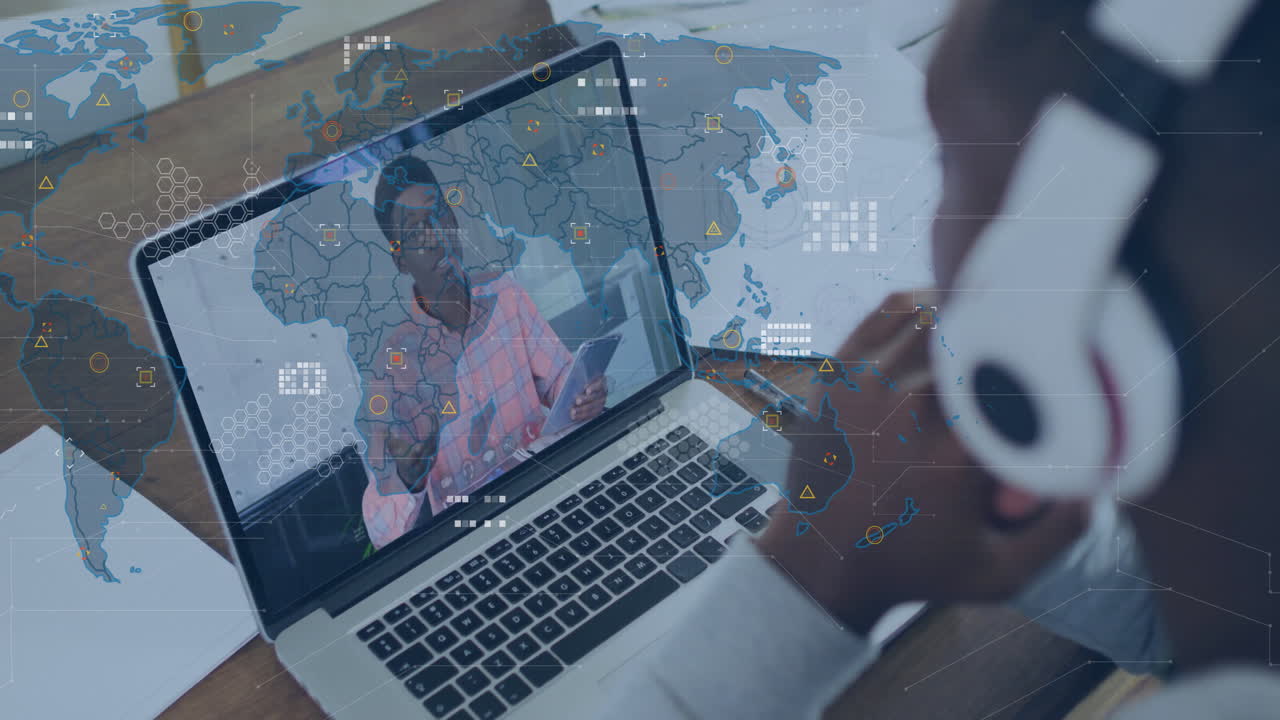 Video conferencing on laptop, person using animation with global network data