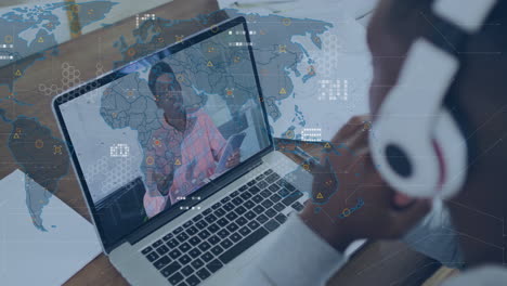 video conferencing on laptop, person using animation with global network data