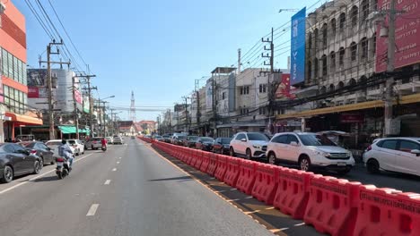 vehicles moving along a divided urban road