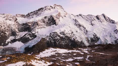 Panorama-shot-of-spectacular-mountains-range-covered-with-snow-during-sunny-day---Mueller-Hut-Route,New-Zealand