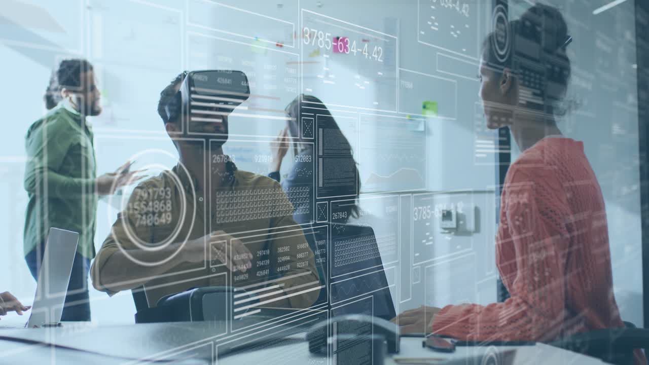 Engineer putting on VR headset and swiping holographic data charts while project manager guiding
