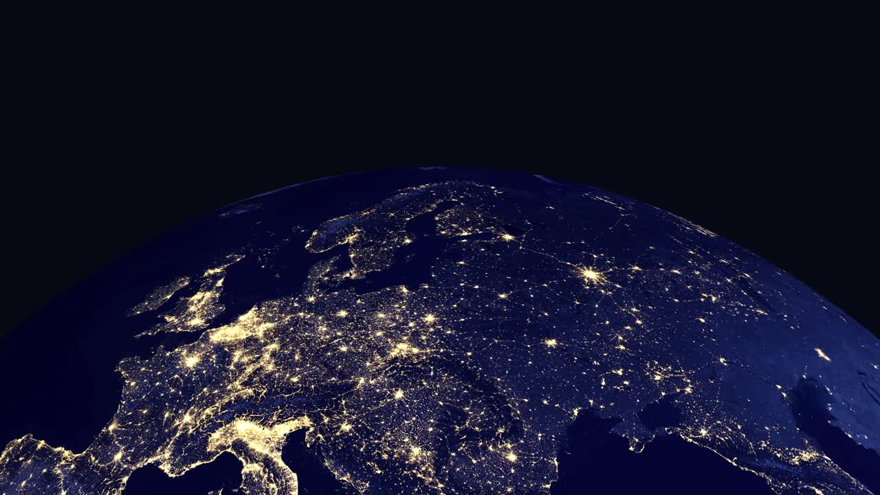 Digital earth rotates and zooms into illuminated European city lights with country name labels