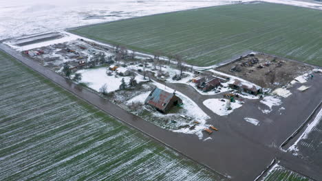 circling a wintery, snowy farm in tehachapi, ca