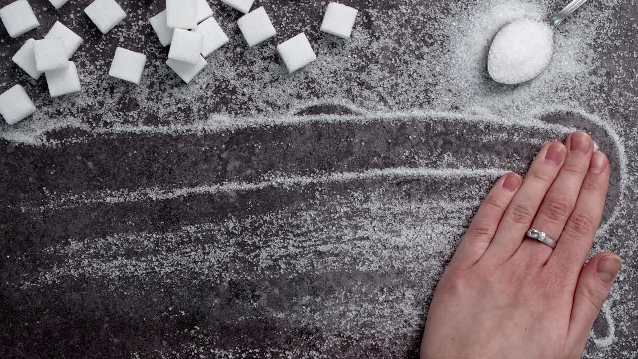 Text &bdquo;sugar&rdquo; written on the black background