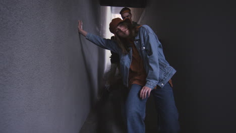 friends dancing on hallway