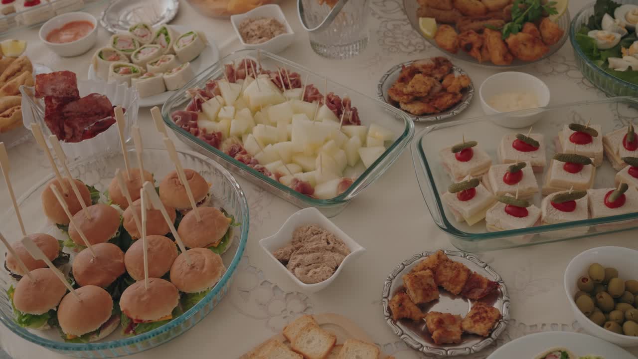 Variety of savory buffet appetizers displayed on a decorated table
