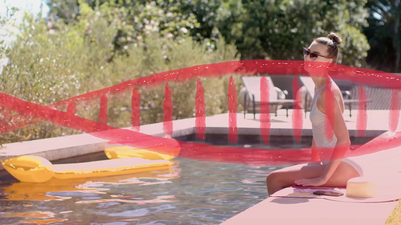 Woman sitting poolside reacting to offscreen call turning smiling with red stroke crossing for ad