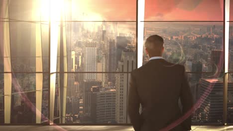 rear view of businessman standing in office