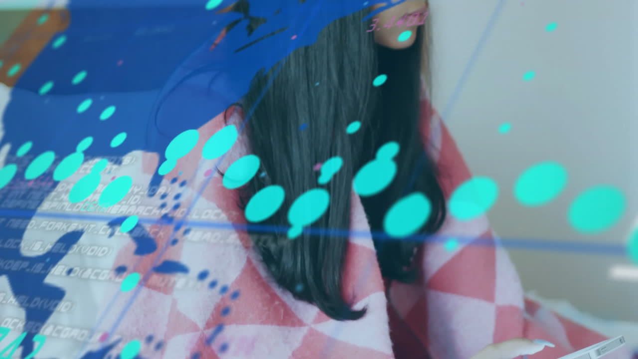 Digital data flow animation over woman wrapped in checkered blanket