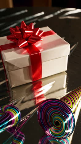 gift box with party horns