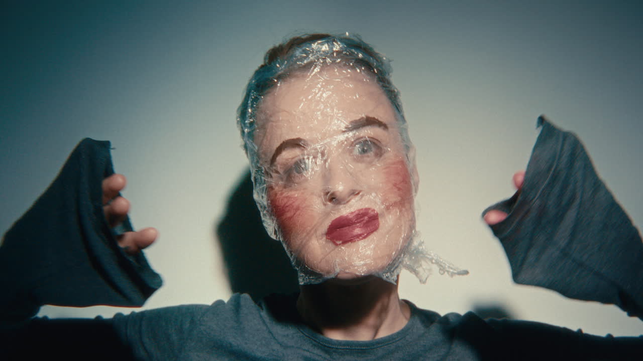 Woman with Plastic Wrap Mask