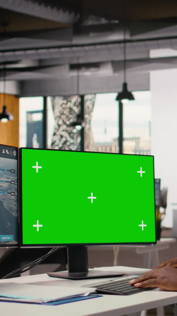 Engineer uses green screen mockup PC to do clean energy production testing