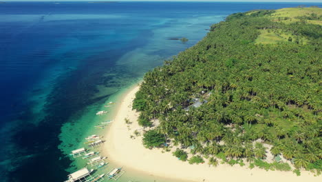 tropical island paradise with pristine beach and boats