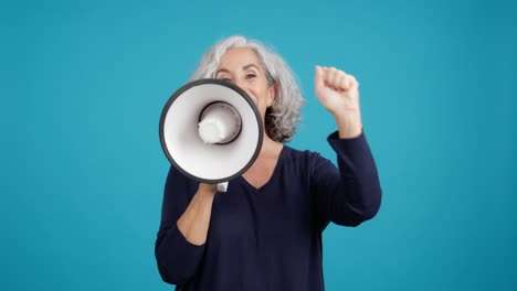senior woman using megaphone