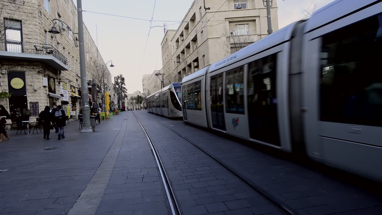 Light Rail passing by Jaffa Street, Jerusalem. Electric tran, clean transportation trolley in Israel