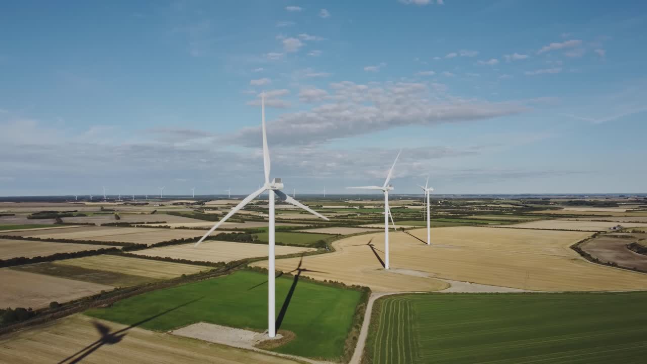 Wind Turbines Generating Alternative Energy At Wind Farm In Thisted, Denmark