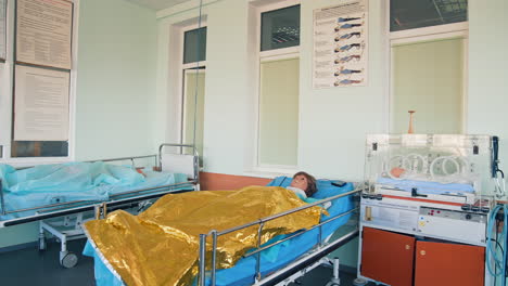 medical mannequin on bed. practicing with medical simulation mannequin in hospital