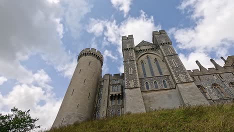 majestic castle towers against a cloudy sky