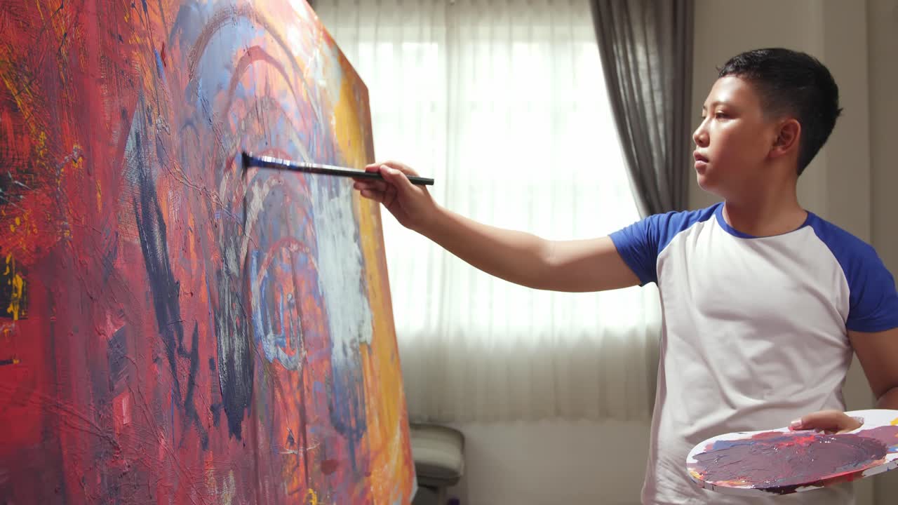 Young Artist Painting Abstract Art