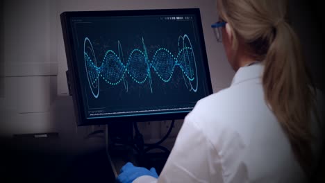 doctor looking dna molecule on computer