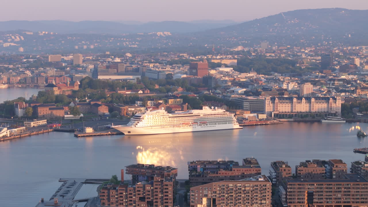Telephoto aerial sunset view of docked cruise ship in Port of Oslo, Norway