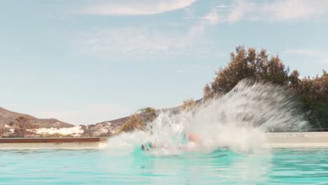 businessman jumping in the swimming pool