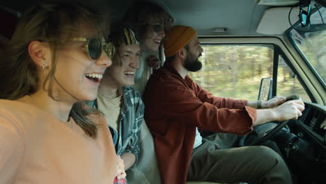 joyous friends enjoying road trip