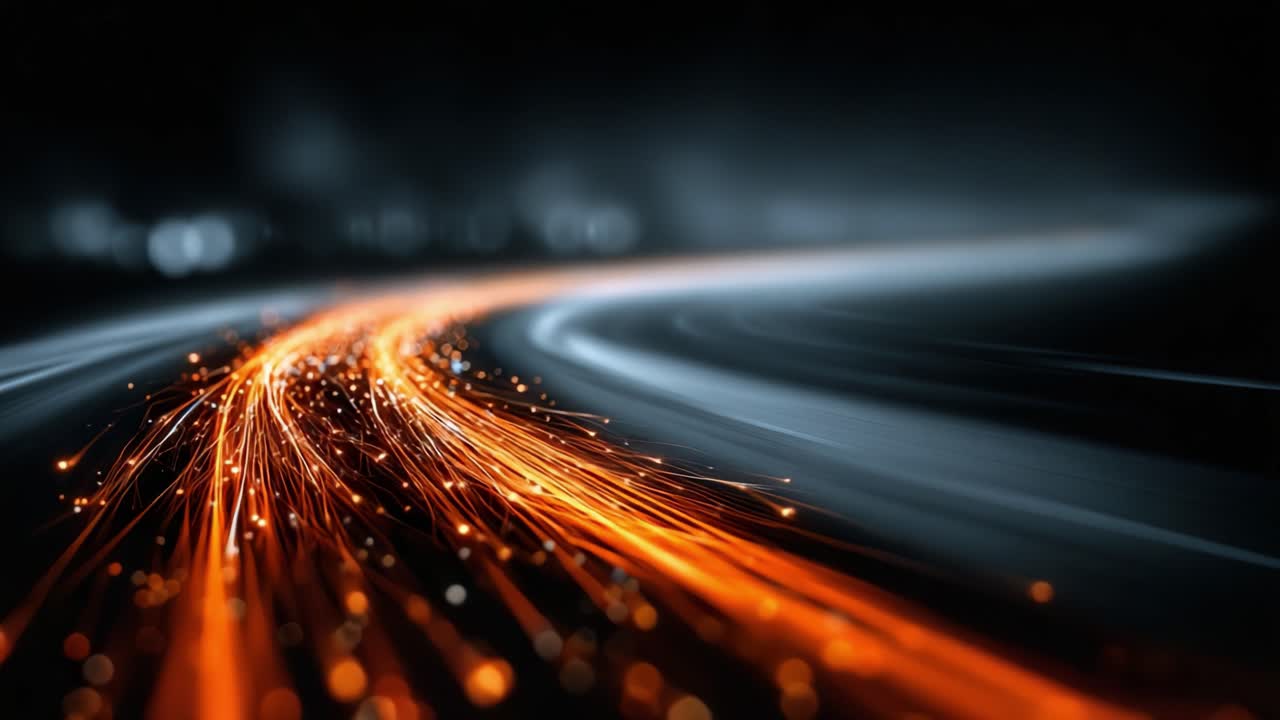 Una rappresentazione dinamica di scie luminose, con vibranti motivi arancioni e tenui grigi, che cattura il flusso e il movimento dell'energia attraverso uno sfondo scuro