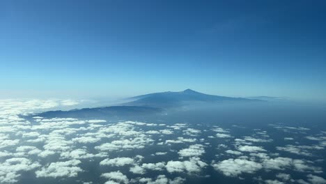 Pilot-point-of-view-of-Tenerife-island-and-Teide-volcano,-Canary-islands,-Spain