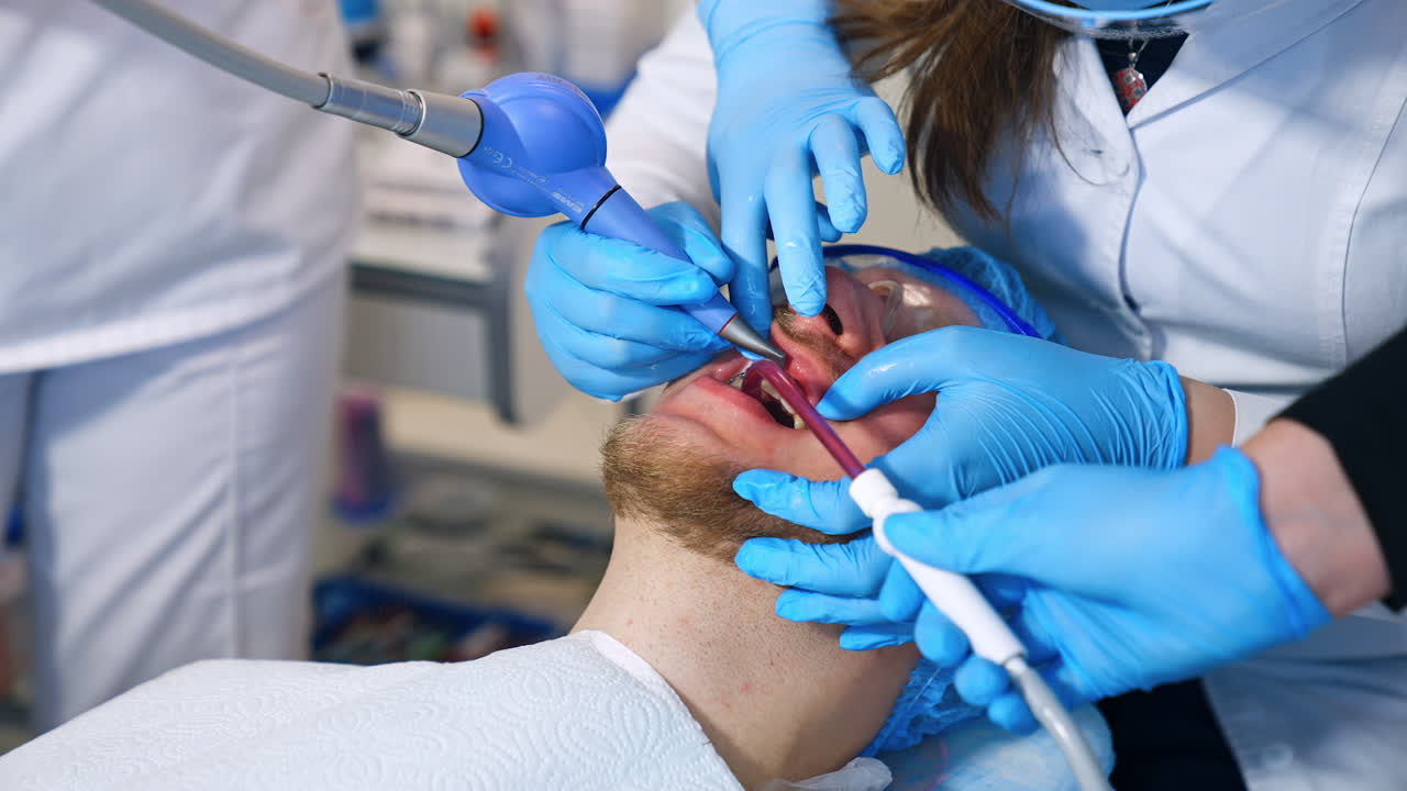 Dental care for the patient with bracket system. Close up. Students studying orthodontic course.