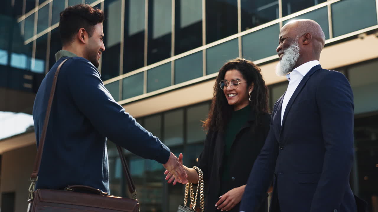 Handshake, city and happy business people