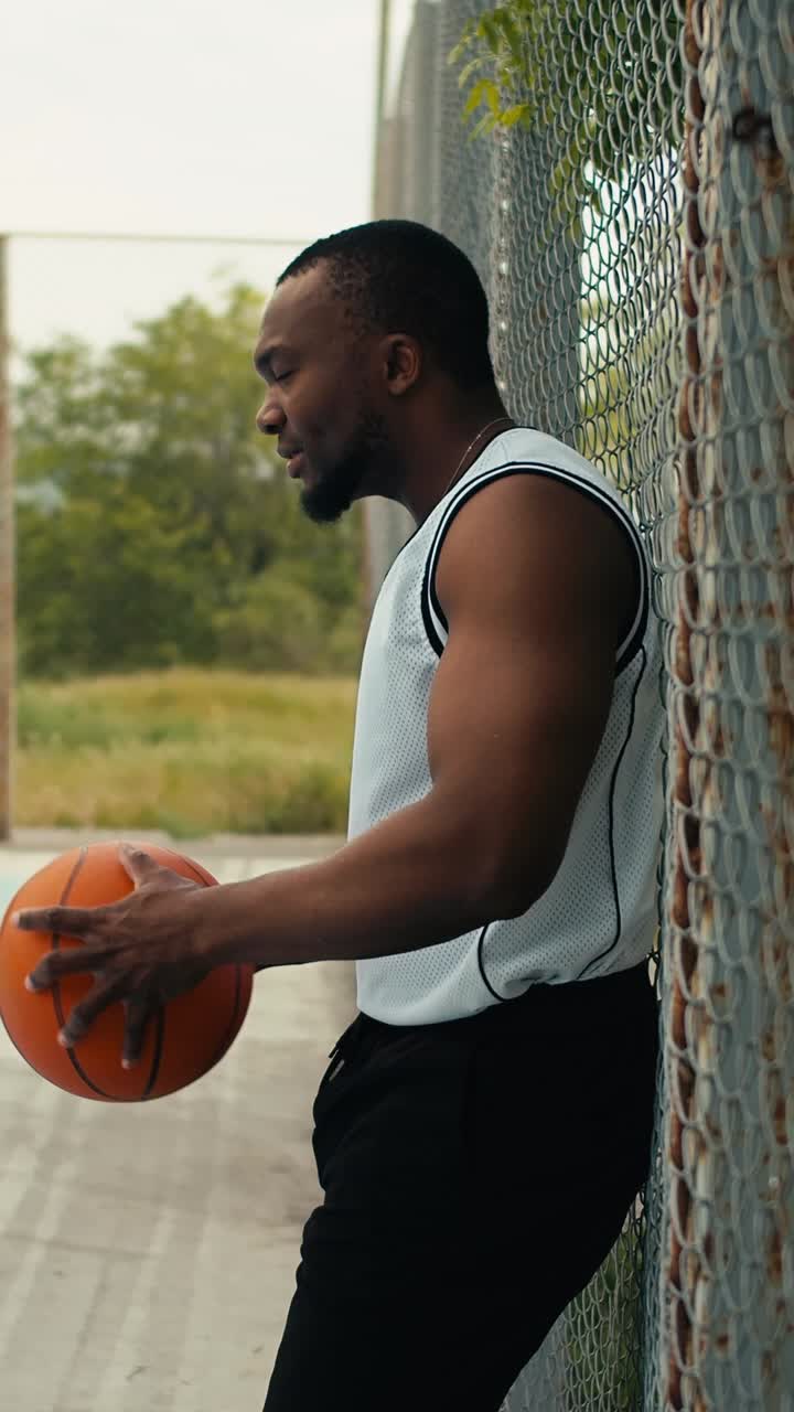 Man Holding Basketball