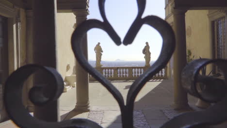 slow motion of statues centering inside heart