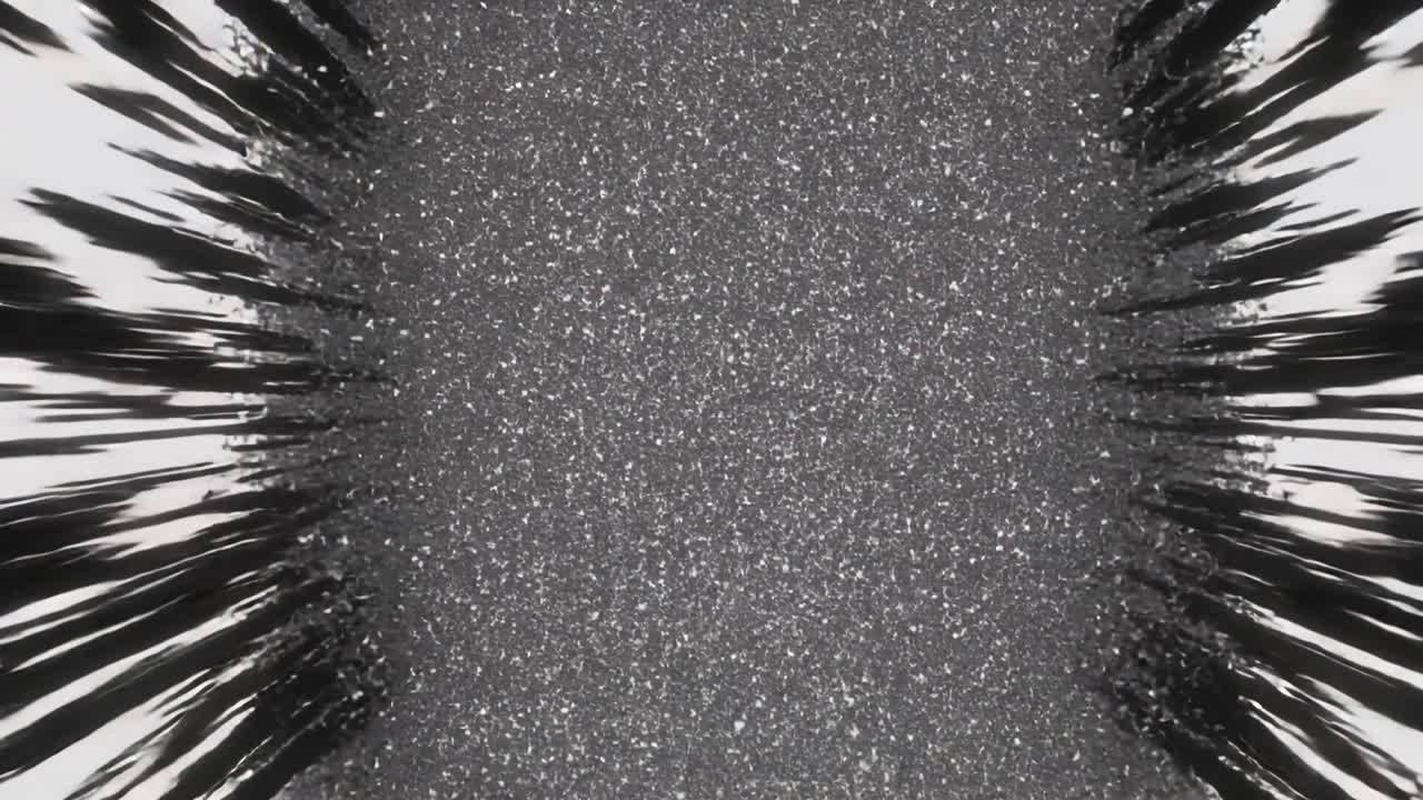 Moving camera pushing through black frames with bars toward dark void, revealing gray grains