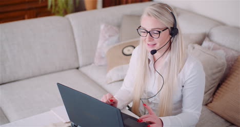 Portrait-Of-Saleswoman-Working-On-Laptop-3