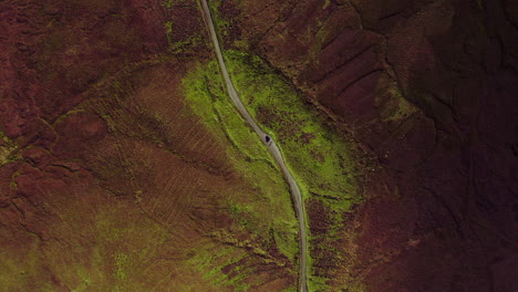 Isle-of-Skye,-Scotland-UK,-Top-Down-Aerial-View-of-Road-in-Island-Inland-With-Autumn-Foliage-Color