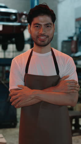 portrait of a mechanic in a garage