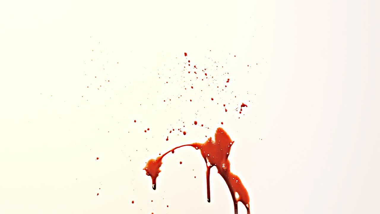 Small Amount of Realistic Red Blood Filmed Hitting White Wall. Shiny Spatter Dripping. Realistic Slime Texture for Horror. Violent Crime Scene Halloween Spooky Background. Compositing Asset