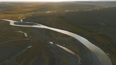 beautiful drone shot overlooking a large river in argentina