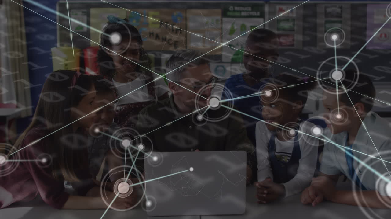 Animation of data processing over caucasian male teacher with diverse schoolchildren using laptop