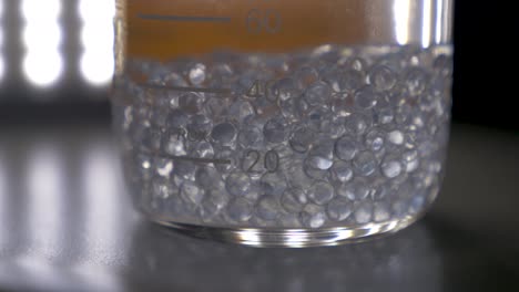 beads inside glass cup