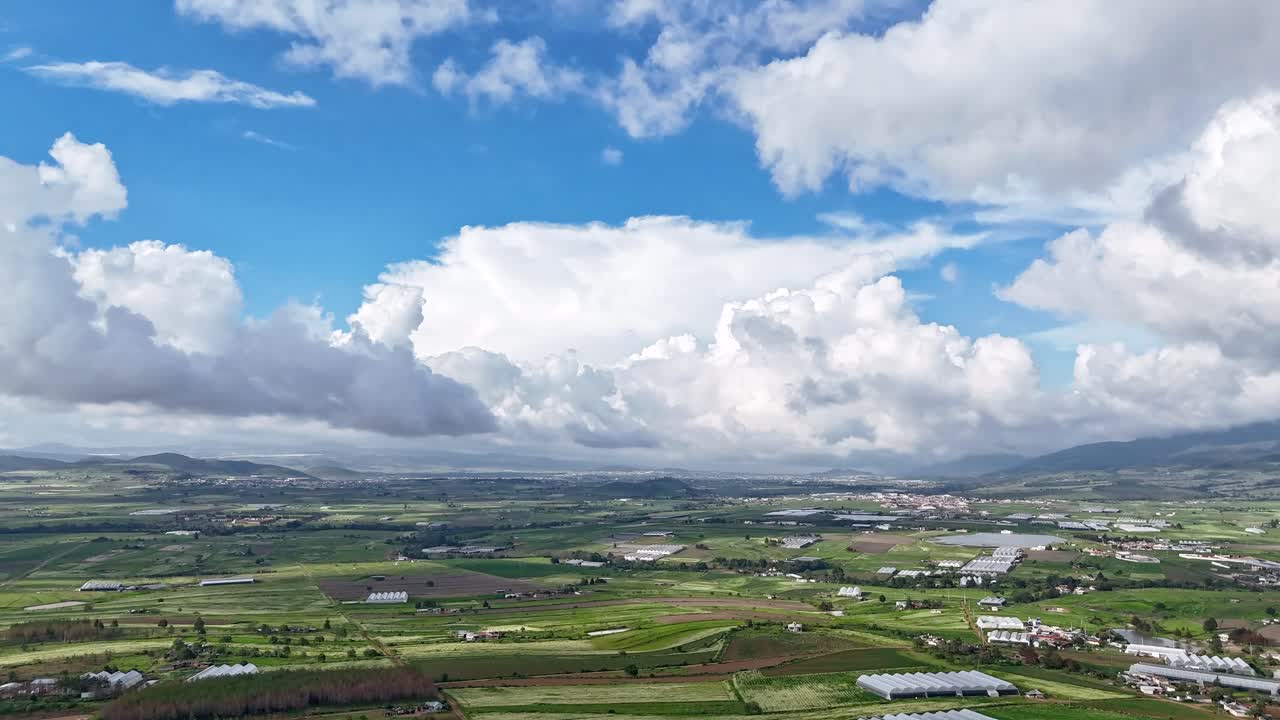 Dynamic Aerial Hyperlapse View of Mexican Green Fields