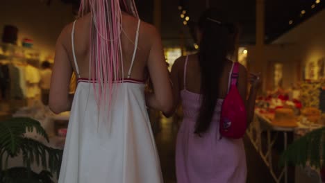 women shopping in dresses