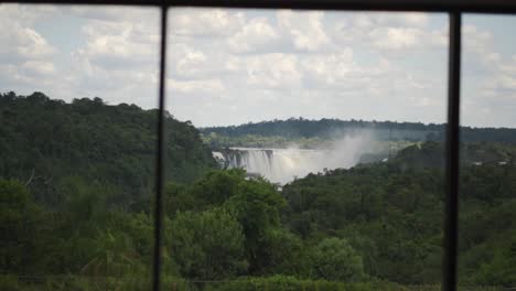 View-from-inside-the-Meliá-Hotel-located-in-the-Iguazu-National-Park,-Argentina,-overlooking-the-magnificent-Iguazu-Falls