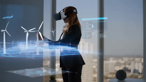 woman using vr headset to interact with holographic wind turbine models and data
