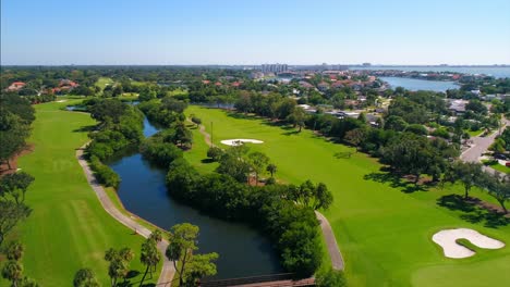 flying over a opulent resort-style golfing community in st