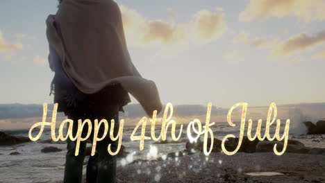 happy 4th of july greeting and couple by the beach 4k