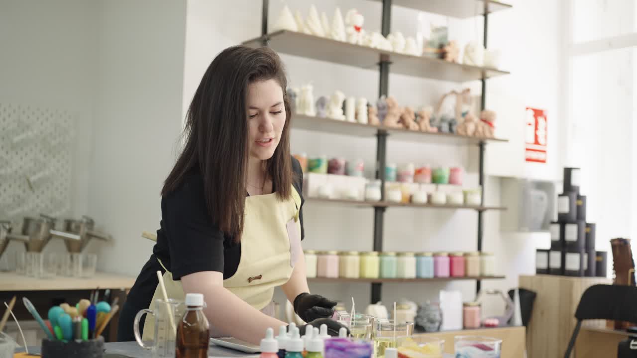 Woman Making Candles in Her Workshop