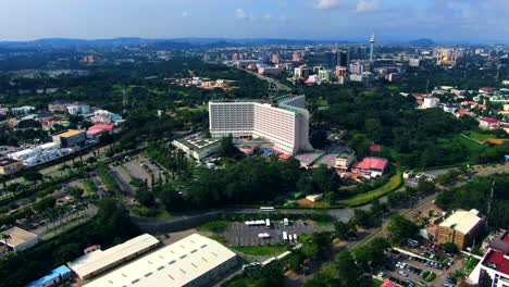 the suburb of abuja, nigeria with the transcorp hilton and other modern businesses